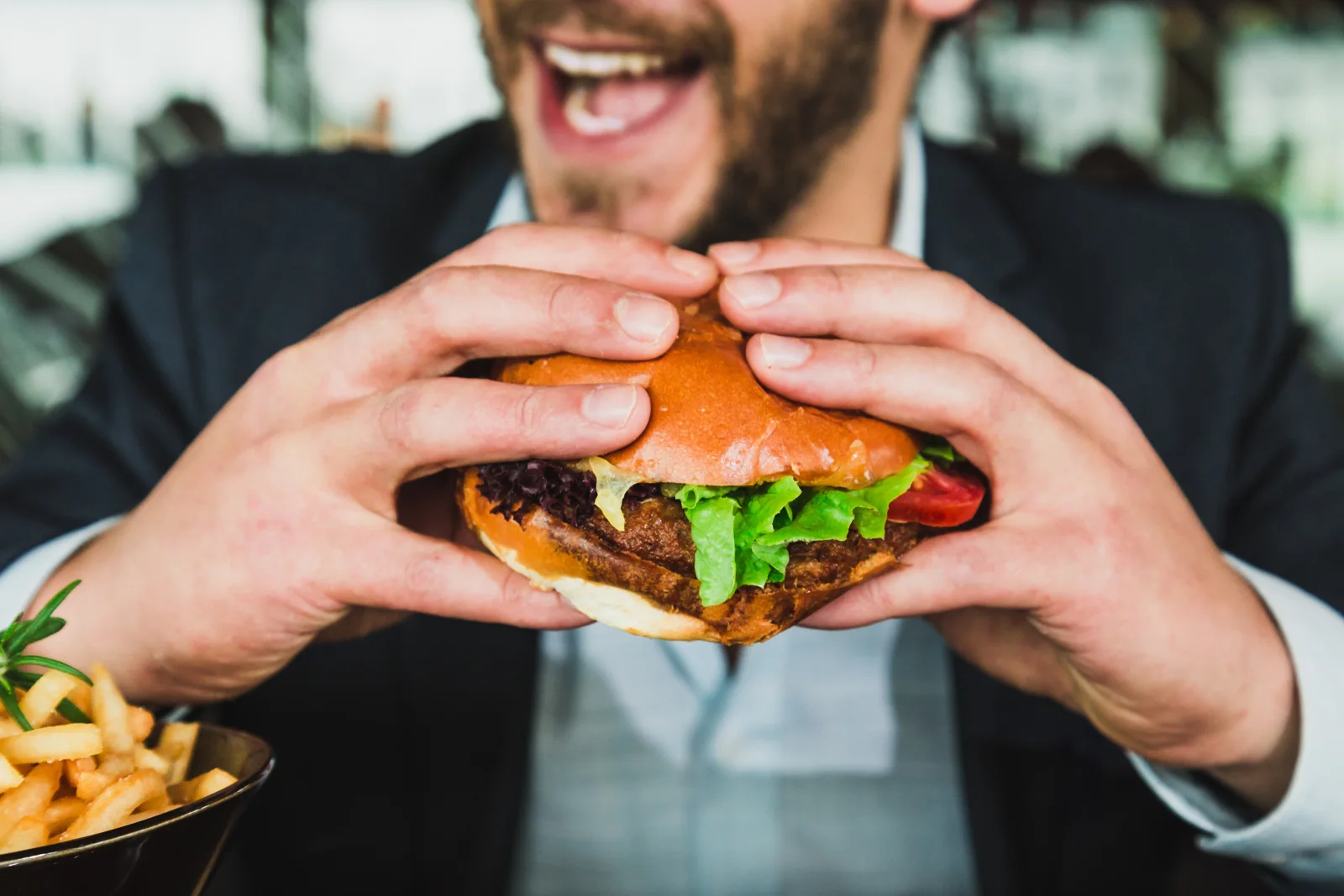 Enjoying a burger during a food break